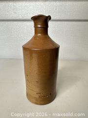 MaxSold Auction: Stamped STEPHENS LONDON Brown Stoneware Bottle/Jug - San Jose (California, USA) SELLER MANAGED Downsizing Online Auction - East Humboldt Street