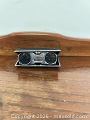 MaxSold Auction: Aud-Ion Pocket Binoculars, Compact/Pocket - Wake Forest (North Carolina, USA) PARTNER MANAGED Downsizing Online Auction - Wait Avenue