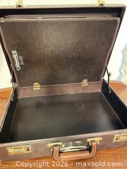 MaxSold Auction: Brown Faux Leather Briefcase with Combination Locks - Wake Forest (North Carolina, USA) PARTNER MANAGED Downsizing Online Auction - Wait Avenue