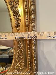 MaxSold Auction: Gilded Wood Octagonal Mirror with Oval Opening, Gold - Wake Forest (North Carolina, USA) PARTNER MANAGED Downsizing Online Auction - Wait Avenue