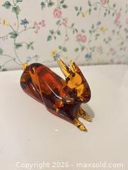 MaxSold Auction: Hand-Blown Amber Glass Rabbit Figurine - Wake Forest (North Carolina, USA) PARTNER MANAGED Downsizing Online Auction - Wait Avenue