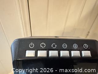 MaxSold Auction: Hunter HPQ15F-E 1500W Black Tower Oscillating Space Heater - Wake Forest (North Carolina, USA) PARTNER MANAGED Downsizing Online Auction - Wait Avenue