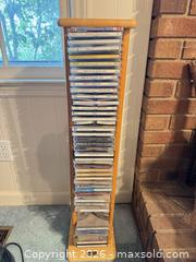 MaxSold Auction: Light Wood CD Tower / Media Rack — Holds ~40–60 CDs - Wake Forest (North Carolina, USA) PARTNER MANAGED Downsizing Online Auction - Wait Avenue