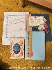 MaxSold Auction: Lot of 4 Softcover Journals / Notebooks — Various Titles - Wake Forest (North Carolina, USA) PARTNER MANAGED Downsizing Online Auction - Wait Avenue