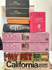 MaxSold Auction: Lot of Jigsaw Puzzles & Games — Whitman, Sports Illustrated, Hallmark - Wake Forest (North Carolina, USA) PARTNER MANAGED Downsizing Online Auction - Wait Avenue