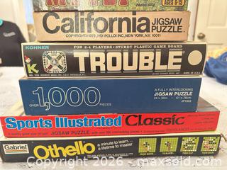 MaxSold Auction: Lot of Jigsaw Puzzles & Games — Whitman, Sports Illustrated, Hallmark - Wake Forest (North Carolina, USA) PARTNER MANAGED Downsizing Online Auction - Wait Avenue