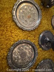 MaxSold Auction: Mixed lot, Sterling, Pewter, and silver plate: Candle Holders, Goblet, Coasters & Small Dish - Wake Forest (North Carolina, USA) PARTNER MANAGED Downsizing Online Auction - Wait Avenue