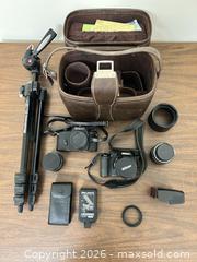 MaxSold Auction: Mixed Nikon Cameras with Lenses, Manfrotto Tripod & Accessories - Wake Forest (North Carolina, USA) PARTNER MANAGED Downsizing Online Auction - Wait Avenue