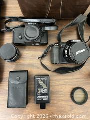 MaxSold Auction: Mixed Nikon Cameras with Lenses, Manfrotto Tripod & Accessories - Wake Forest (North Carolina, USA) PARTNER MANAGED Downsizing Online Auction - Wait Avenue