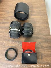 MaxSold Auction: Mixed Nikon Cameras with Lenses, Manfrotto Tripod & Accessories - Wake Forest (North Carolina, USA) PARTNER MANAGED Downsizing Online Auction - Wait Avenue