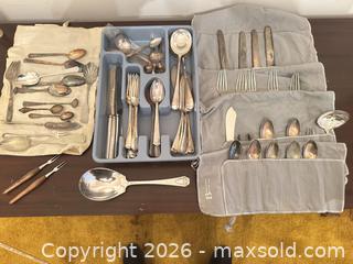 MaxSold Auction: Mixed Silver-Plated Flatware Set with Storage Roll - Wake Forest (North Carolina, USA) PARTNER MANAGED Downsizing Online Auction - Wait Avenue