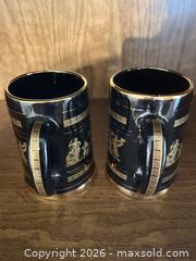 MaxSold Auction: Pair of Black & Gold Porcelain Steins with Greek Figures - Wake Forest (North Carolina, USA) PARTNER MANAGED Downsizing Online Auction - Wait Avenue