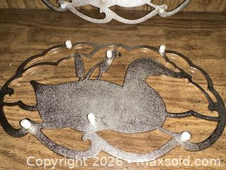 MaxSold Auction: Set of 2 vintage metal hot plate trivets  - Wake Forest (North Carolina, USA) PARTNER MANAGED Downsizing Online Auction - Wait Avenue