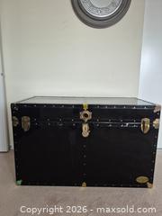 MaxSold Auction: Large Black Steamer Trunk with Brass Accents - Ajax (Ontario, Canada) PARTNER MANAGED Downsizing Online Auction - Grainger Crescent