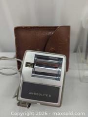 MaxSold Auction: Vintage Camera Accessories Lot: Flash, Light Meter, Tally Counter, Clamp - Toronto (Ontario, Canada) SELLER MANAGED Downsizing Online Auction - Dupont Street (STORAGE)