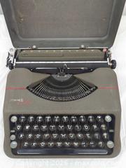MaxSold Auction: Vintage Hermes Rocket Portable Manual Typewriter — Olive Green/Gray - Toronto (Ontario, Canada) SELLER MANAGED Downsizing Online Auction - Dupont Street (STORAGE)