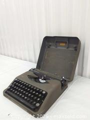 MaxSold Auction: Vintage Hermes Rocket Portable Manual Typewriter — Olive Green/Gray - Toronto (Ontario, Canada) SELLER MANAGED Downsizing Online Auction - Dupont Street (STORAGE)
