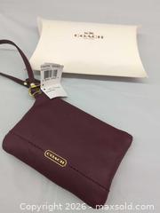 MaxSold Auction: Y2K Coach canvas shoulder bag and wristlet  - Toronto (Ontario, Canada) SELLER MANAGED Downsizing Online Auction - Dupont Street (STORAGE)