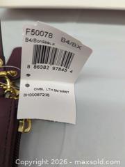 MaxSold Auction: Y2K Coach canvas shoulder bag and wristlet  - Toronto (Ontario, Canada) SELLER MANAGED Downsizing Online Auction - Dupont Street (STORAGE)