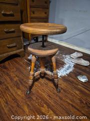 MaxSold Auction: Adjustable Antique Piano/Vanity Stool — Wood with Brass Casters - Quinte West (Ontario, Canada) SELLER MANAGED Reseller Online Auction -  Fairground Road