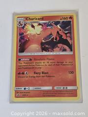 MaxSold Auction: Pokemon Charizard Dragon Majesty Holo Mint 3/70 - Toronto (Ontario, Canada) SELLER MANAGED Downsizing Online Auction - McAdam Avenue