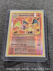 MaxSold Auction: Pokemon Charizard Evolutions Reverse Holo Mint 11/106 - Toronto (Ontario, Canada) SELLER MANAGED Downsizing Online Auction - Mcadam Avenue