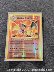 MaxSold Auction: Pokemon Charizard Evolutions Reverse Holo Mint 11/106 - Toronto (Ontario, Canada) SELLER MANAGED Downsizing Online Auction - Mcadam Avenue