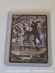 MaxSold Auction: Pokemon Umbreon V Brilliant Stars Trainer Gallery Alternate Art Mint  - Toronto (Ontario, Canada) SELLER MANAGED Downsizing Online Auction - Mcadam Avenue