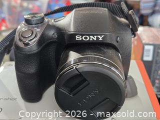 MaxSold Auction: Sony DSC?H300 Digital Camera with Optical SteadyShot in Original Box Working - Toronto (Ontario, Canada) SELLER MANAGED Downsizing Online Auction - Mcadam Avenue