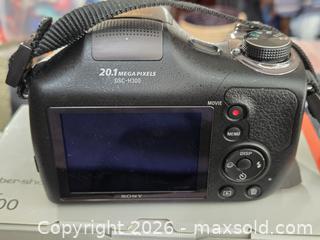 MaxSold Auction: Sony DSC?H300 Digital Camera with Optical SteadyShot in Original Box Working - Toronto (Ontario, Canada) SELLER MANAGED Downsizing Online Auction - Mcadam Avenue