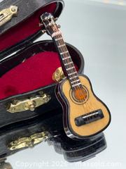 MaxSold Auction: Collectible miniature acoustic guitar lapel pin - Menlo Park (California, USA) SELLER MANAGED Downsizing Online Auction - Henderson Place
