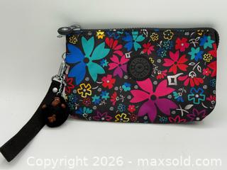 MaxSold Auction: Kipling Creativity Extra Large Wristlet with colorful floral pattern and monkey keychain - Menlo Park (California, USA) SELLER MANAGED Downsizing Online Auction - Henderson Place