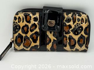 MaxSold Auction: Loungefly Hello Kitty Leopard Print Wallet - Menlo Park (California, USA) SELLER MANAGED Downsizing Online Auction - Henderson Place