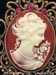 MaxSold Auction: Victorian-style necklace featuring a cameo pendant with red and white accents - Menlo Park (California, USA) SELLER MANAGED Downsizing Online Auction - Henderson Place