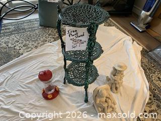 MaxSold Auction: Three-Tier Cast Iron Plant Stand with Garden Statues & Feeder - Belleville (Ontario, Canada) SELLER MANAGED Moving Online Auction - Covington Crescent