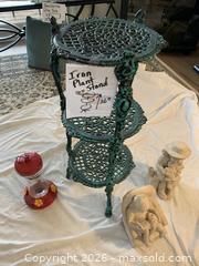 MaxSold Auction: Three-Tier Cast Iron Plant Stand with Garden Statues & Feeder - Belleville (Ontario, Canada) SELLER MANAGED Moving Online Auction - Covington Crescent