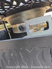 MaxSold Auction: Black Metal Propane Fire pit, cover, see pictures - Longmont (Colorado, USA) PARTNER MANAGED Estate Sale Online Auction -  Twilight Court