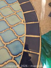 MaxSold Auction: Round outdoor dining table with mosaic tile top and steel frame and cover - Longmont (Colorado, USA) PARTNER MANAGED Estate Sale Online Auction -  Twilight Court