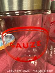 MaxSold Auction: Set of 4 Merco Glass Apothecary Jars with Red Decal - Renfrew (Ontario, Canada) SELLER MANAGED Downsizing Online Auction - Plaunt Street