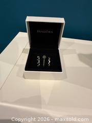 MaxSold Auction: Pandora Sterling Silver Stacking Rings with Green Stone – Set of 3 – Original Box - Toronto (Ontario, Canada) SELLER MANAGED Moving Online Auction - Snowdon Avenue