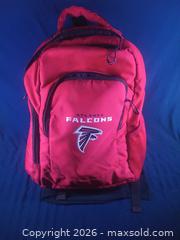 MaxSold Auction: Atlanta Falcons Red Canvas Backpack with Laptop Compartment - Pacifica (California, USA) SELLER MANAGED Downsizing Online Auction -  Palmetto Avenue (CONDO)