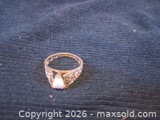 MaxSold Auction: Filigree Vintage-Style white Opal Ring, Stamped 18K - Pacifica (California, USA) SELLER MANAGED Downsizing Online Auction -  Palmetto Avenue (CONDO)