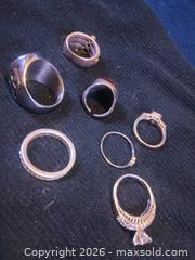 MaxSold Auction: Mixed-Metal Sterling & Plated Rings Lot (6-8 pcs) - Pacifica (California, USA) SELLER MANAGED Downsizing Online Auction -  Palmetto Avenue (CONDO)