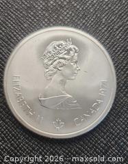 MaxSold Auction: 1976 Montreal Olympics 10 Dollar Coin, SILVER, weighs 48grams - Mississauga (Ontario, Canada) SELLER MANAGED Downsizing Online Auction - Golden Orchard Drive (CONDO)