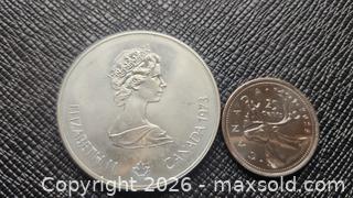 MaxSold Auction: 5-dollar SILVER coin, 24 grams - Mississauga (Ontario, Canada) SELLER MANAGED Downsizing Online Auction - Golden Orchard Drive (CONDO)