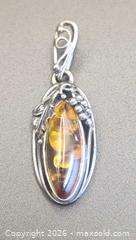 MaxSold Auction: Antique Art Nouveau  amber and sterling silver pendant - Mississauga (Ontario, Canada) SELLER MANAGED Downsizing Online Auction - Golden Orchard Drive (CONDO)