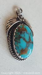 MaxSold Auction: Indigenous American handcrafted turquoise and sterling silver pendant - Mississauga (Ontario, Canada) SELLER MANAGED Downsizing Online Auction - Golden Orchard Drive (CONDO)