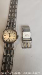 MaxSold Auction:  Swiss Empress 17 Jewels SILVER ladies' vintage wristwatch. - Mississauga (Ontario, Canada) SELLER MANAGED Downsizing Online Auction - Golden Orchard Drive (CONDO)