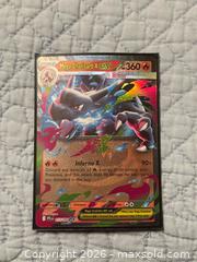 MaxSold Auction: Pokemon Mega Charizard X EX Card - Toronto (Ontario, Canada) SELLER MANAGED Downsizing Online Auction - Collingdale Road