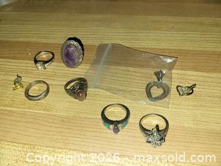 MaxSold Auction: Sterling Silver lot Rings Pendants Earring - Rubies Sapphire Emerald 41.86gr - East Zorra-Tavistock (Ontario, Canada) SELLER MANAGED Downsizing Online Auction - Highway 59